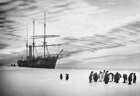 Aurora alongside the ice off Western Base, 1911-1914, by Frank Hurley.